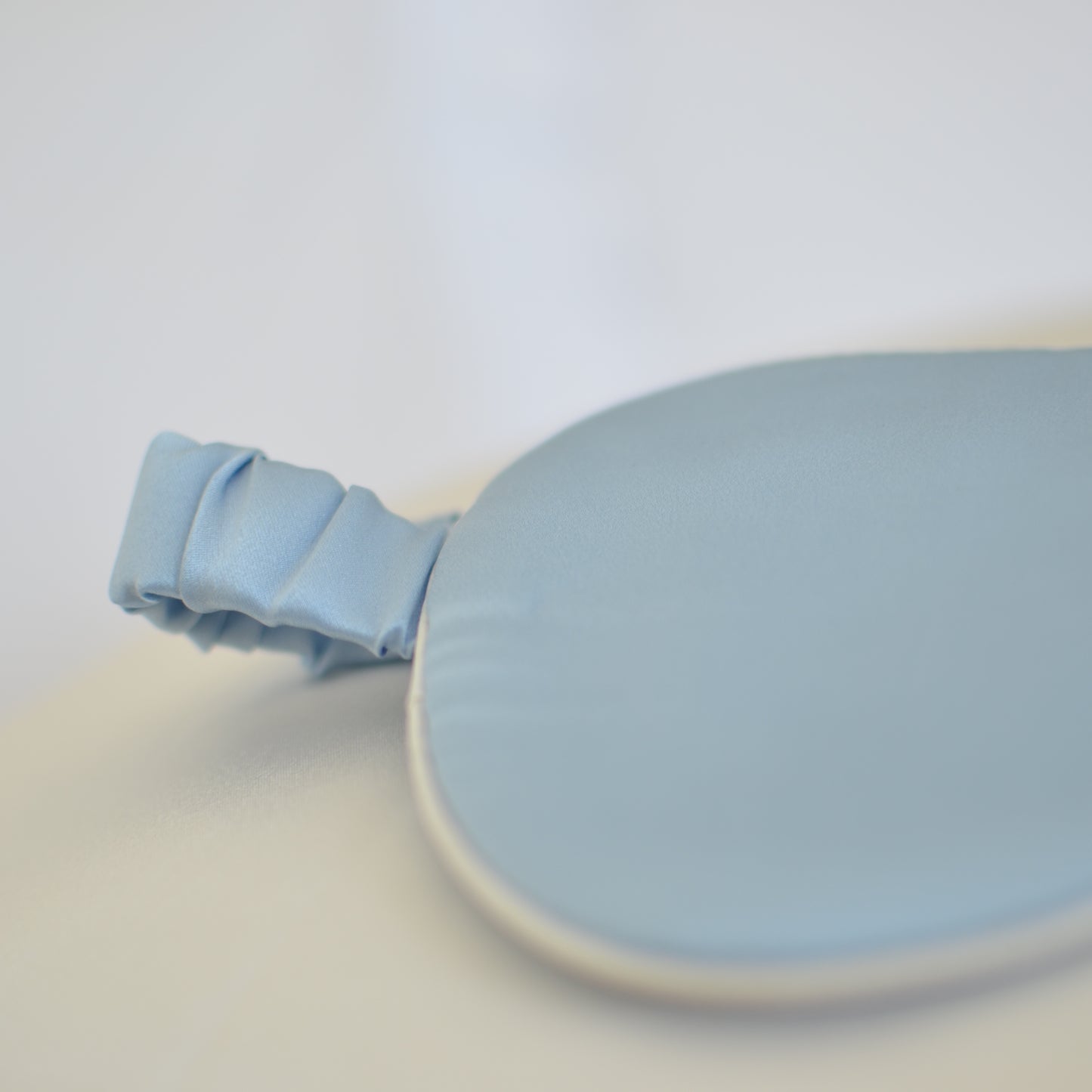 Silk sleep mask baby blue with white trim