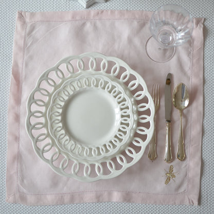 Pink cotton napkin with a bumblebee motif