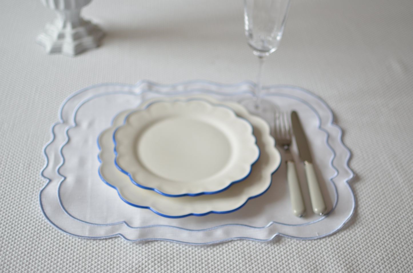 White cotton table mat with blue piping set of two