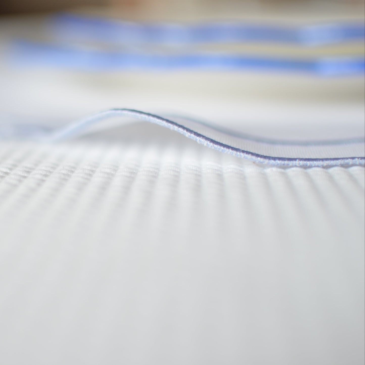 White cotton table mat with blue piping set of two
