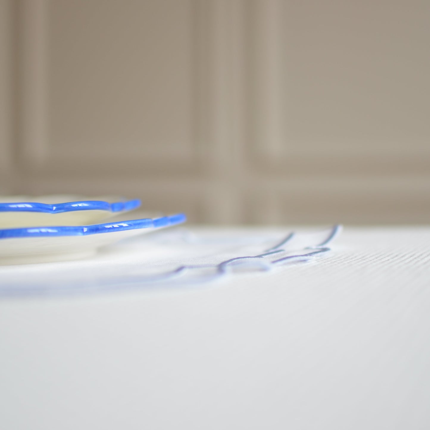 White cotton table mat with blue piping set of two