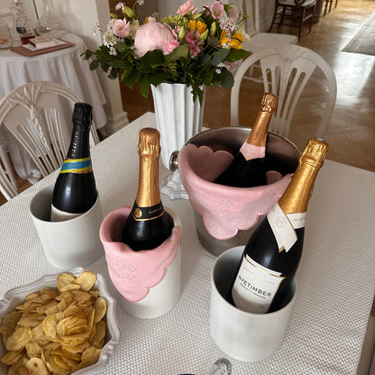 Monogrammed pink linen napkin with a pink scalloped edge