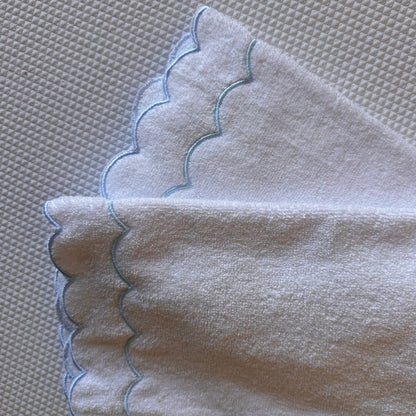 A scalloped edge hand towel set of two