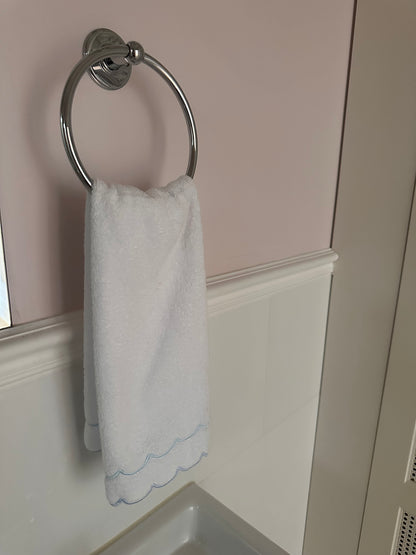 A scalloped edge hand towel set of two