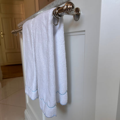 A scalloped edge hand towel set of two
