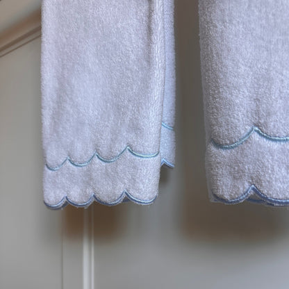 A scalloped edge hand towel set of two