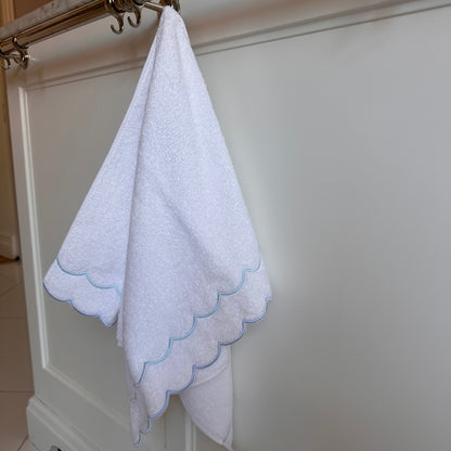 A scalloped edge hand towel set of two