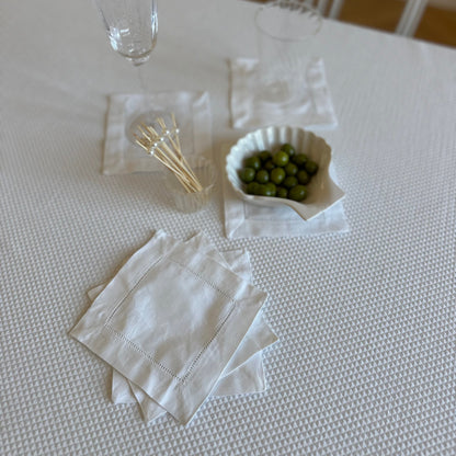 White linen coasters. Set of four.
