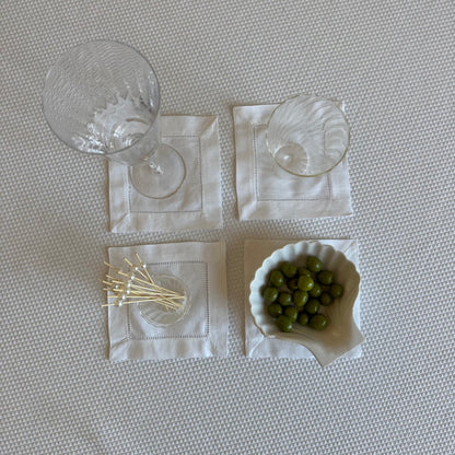 White linen coasters. Set of four.