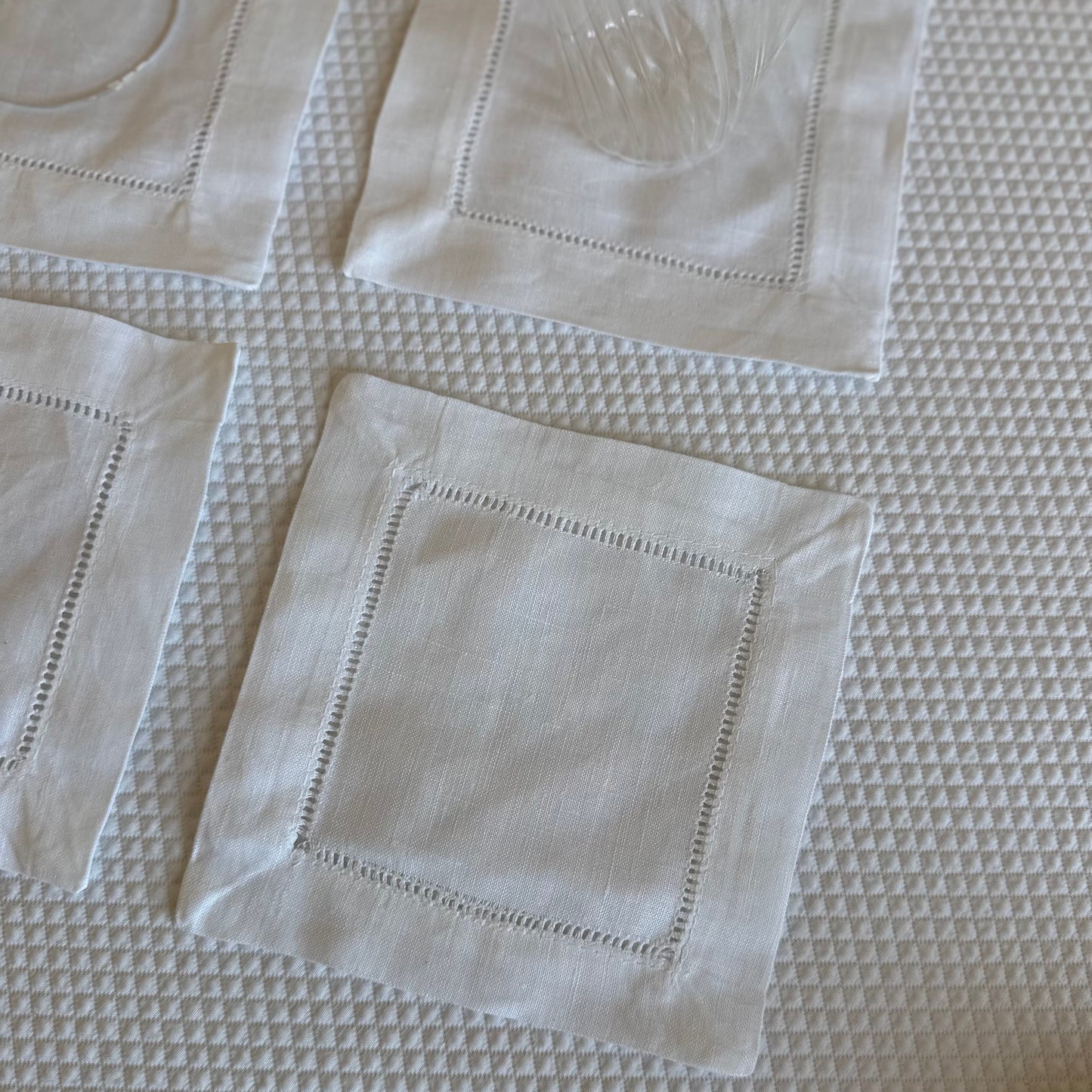 White linen coasters. Set of four.