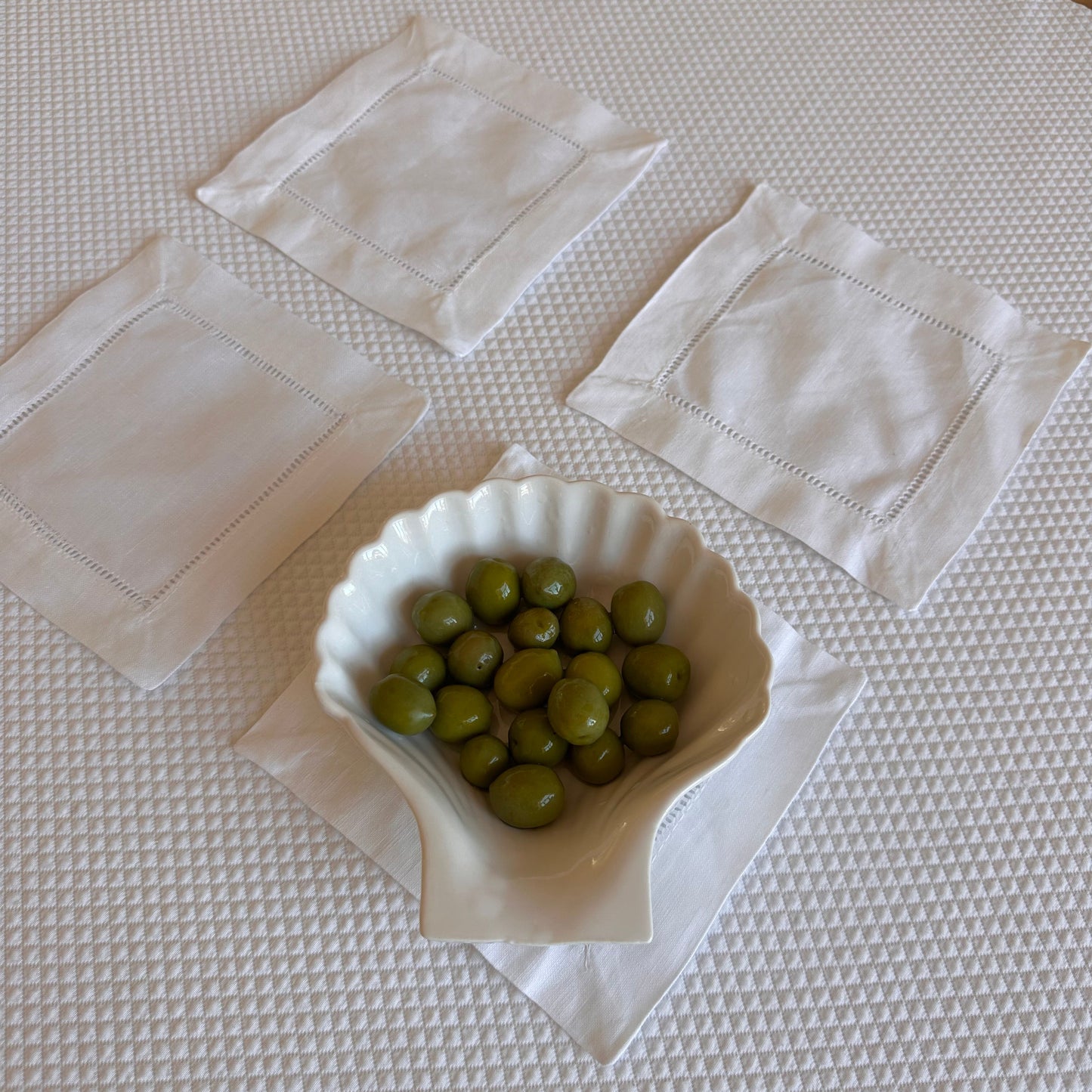 White linen coasters. Set of four.